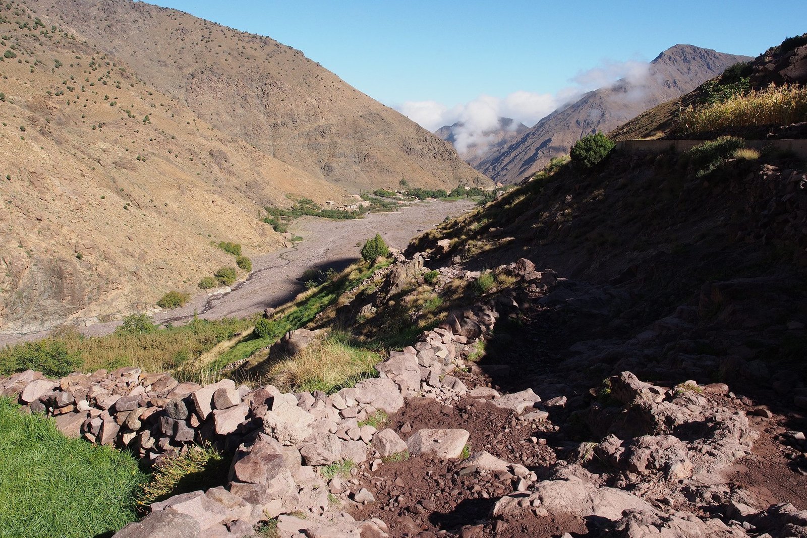 Riverbed and stony slopes in the valley on the way to Sidi Chamharouch